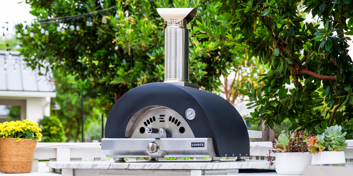 coyote gas outdoor pizza oven on granite countertop