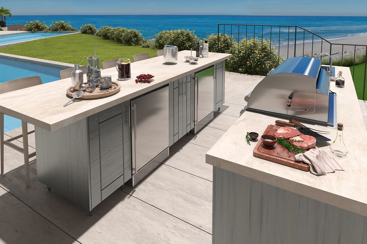 two weatherstrong cabinets with bar island and grill island