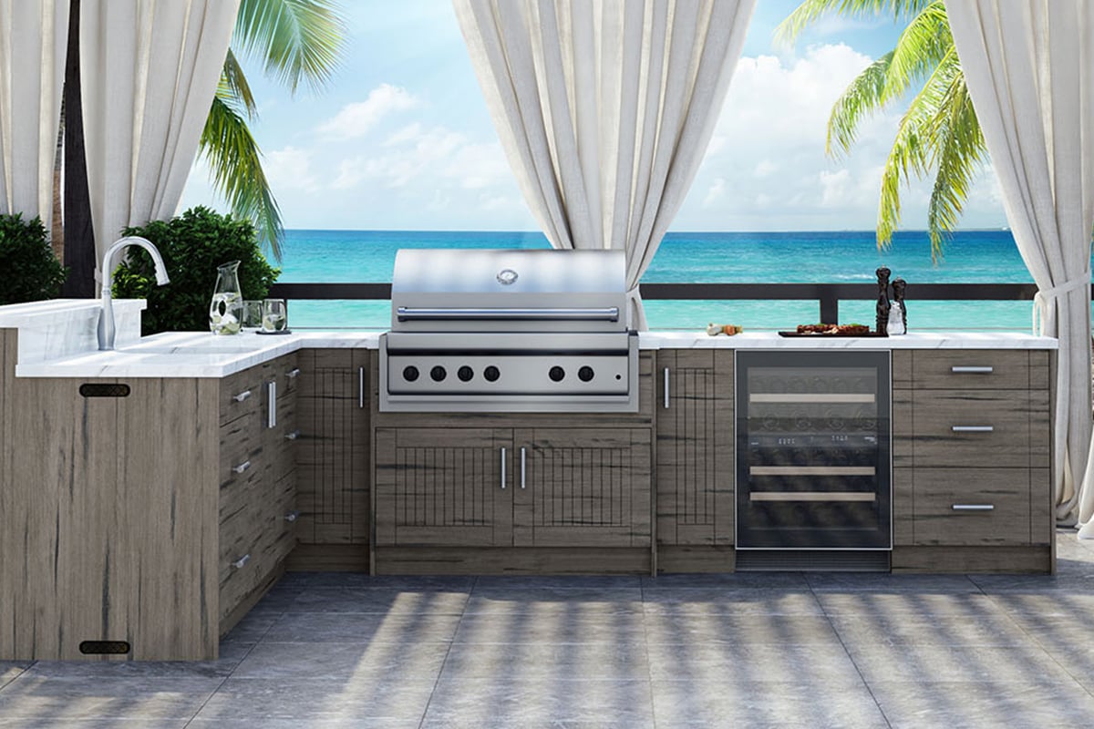 l shaped outdoor kitchen with waterfront view