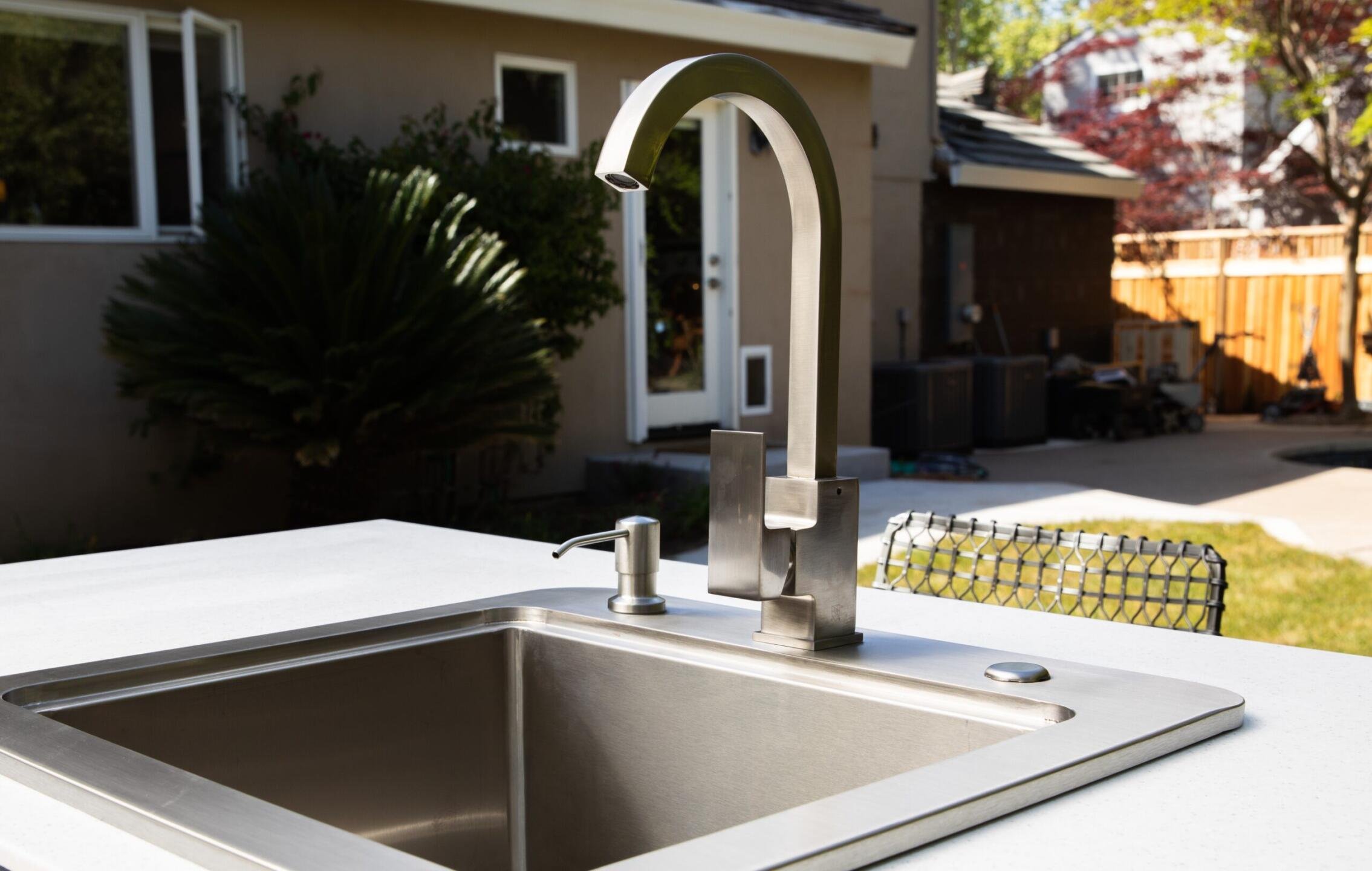 Close up of a coyote outdoor sink placed in an RTA countertop