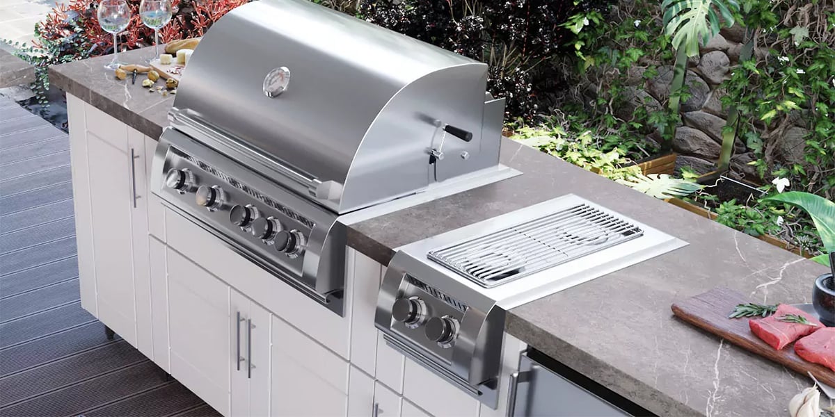 outdoor kitchen with grill and dual side burner