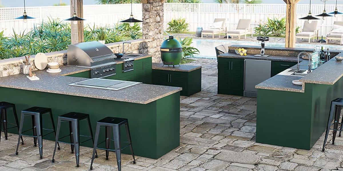 two l shaped outdoor kitchens facing each other