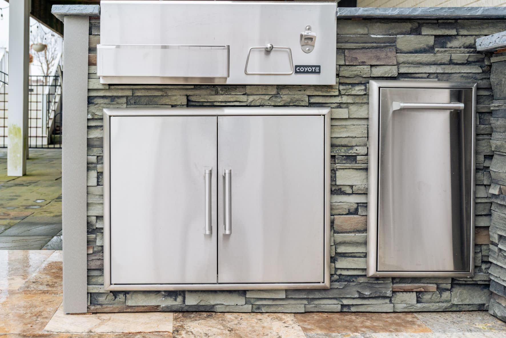 access doors built into outdoor kitchen bar