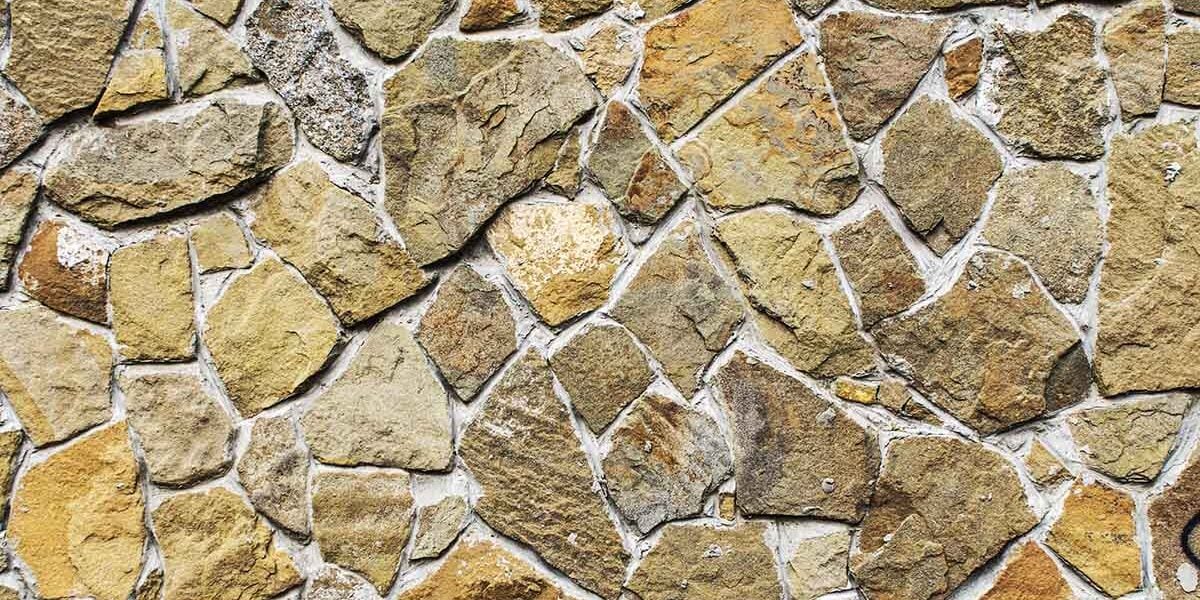 an image of a stone finish on an outdoor kitchen wall