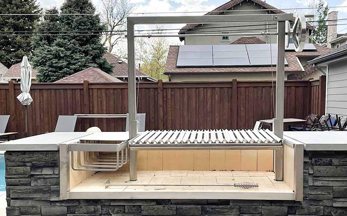 Argentinian grill in outdoor kitchen