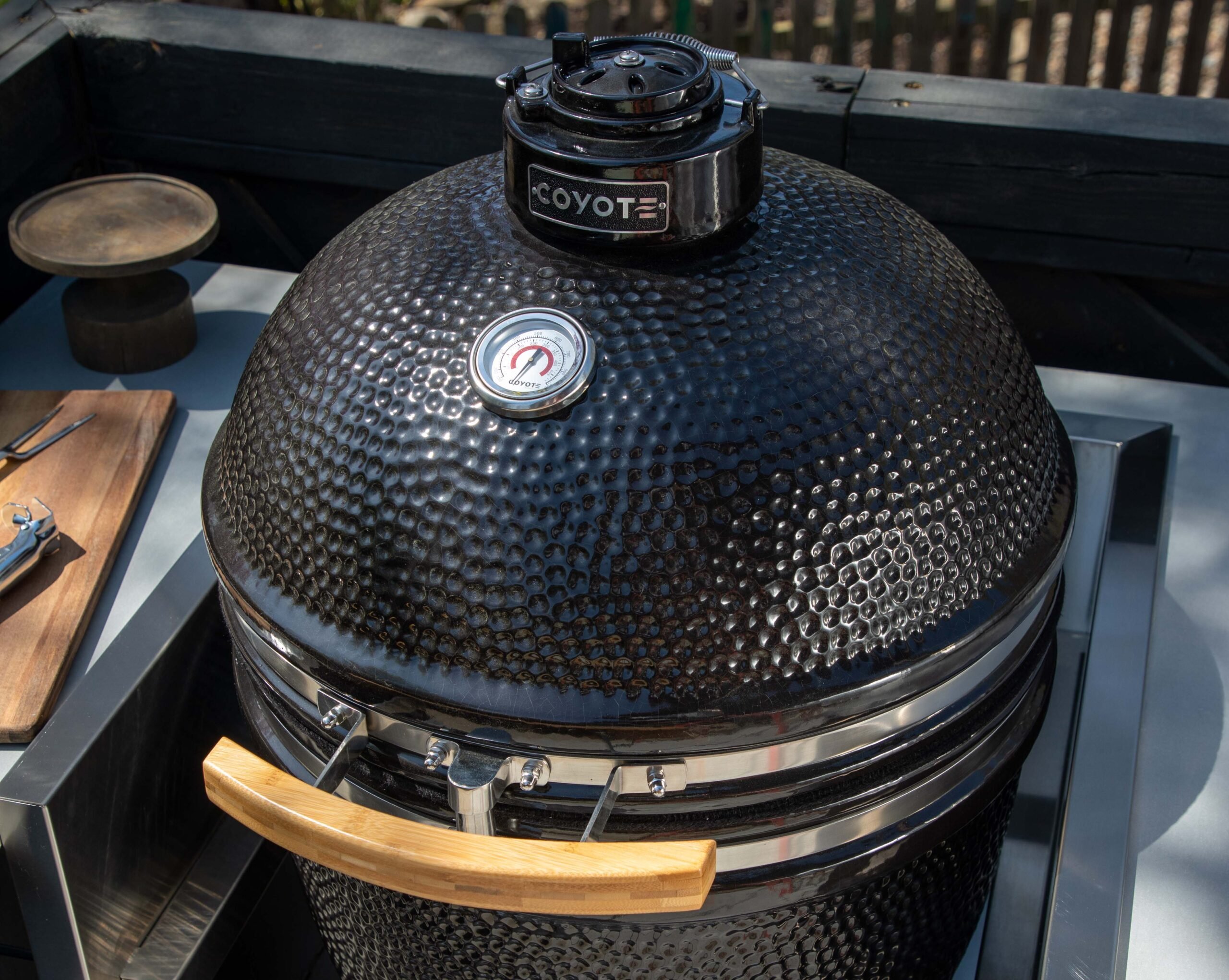 Coyote Asado Smoker in a built-in sleeve