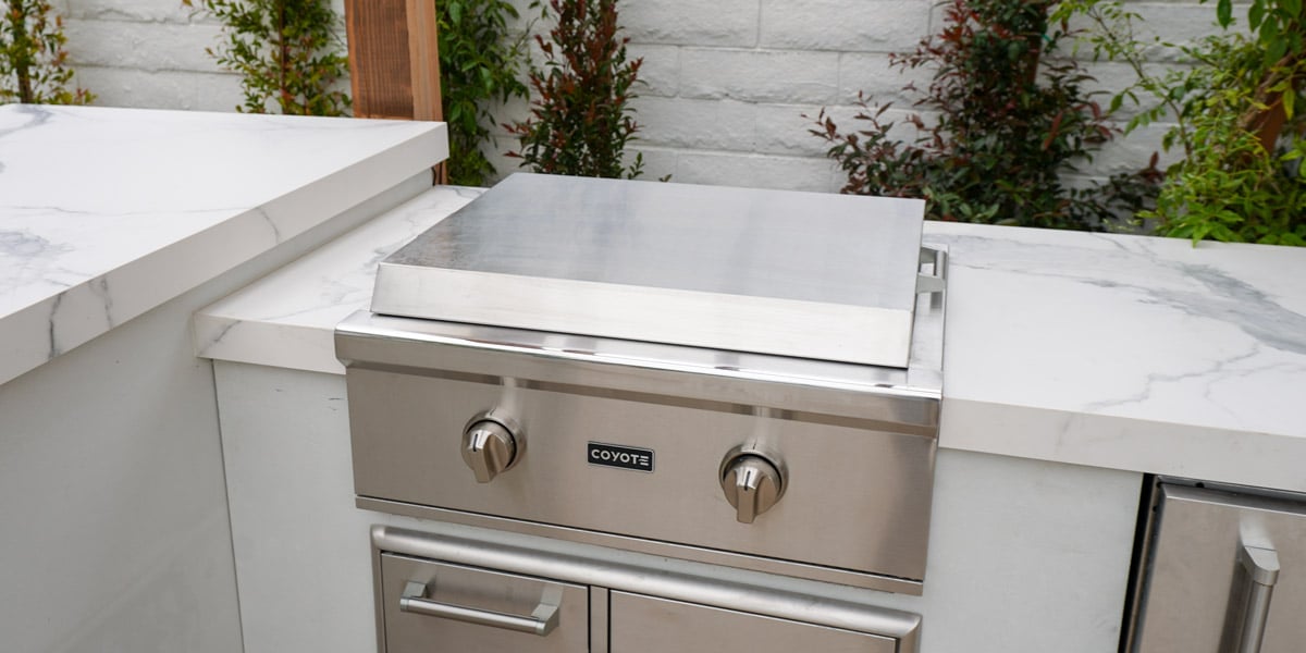 built in coyote flat top grill