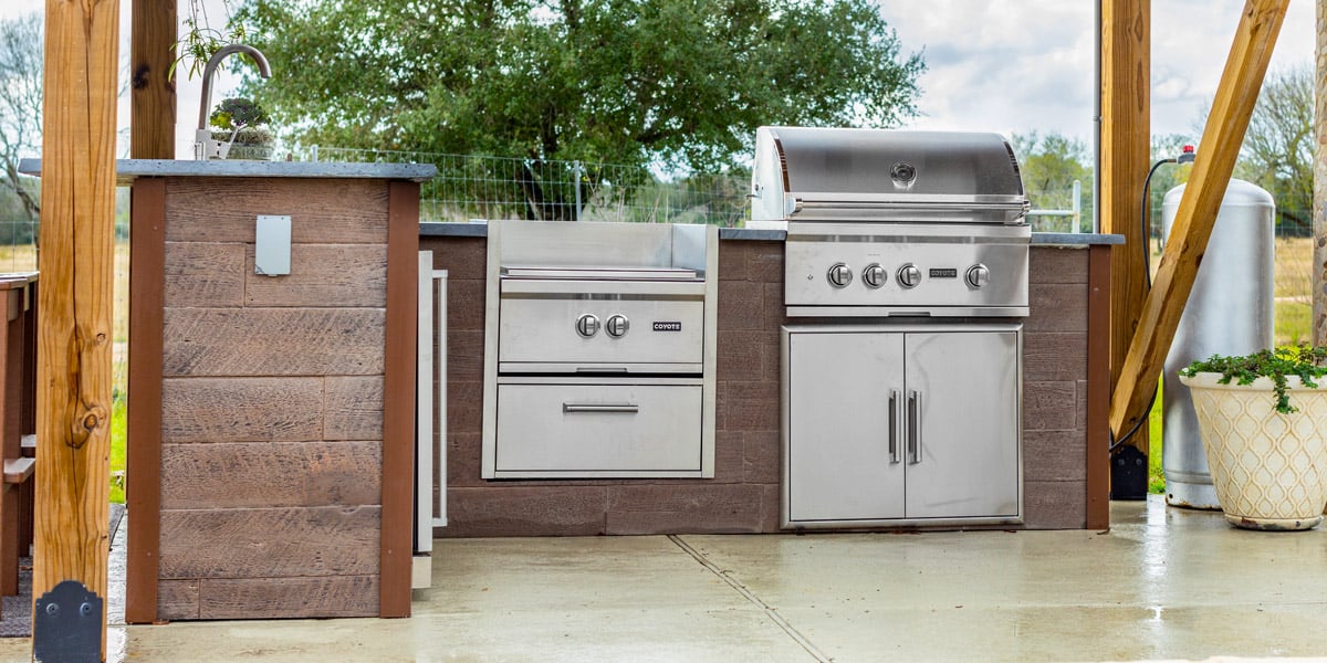 built in natural gas stainless steel grill with power burner in outdoor kitchen