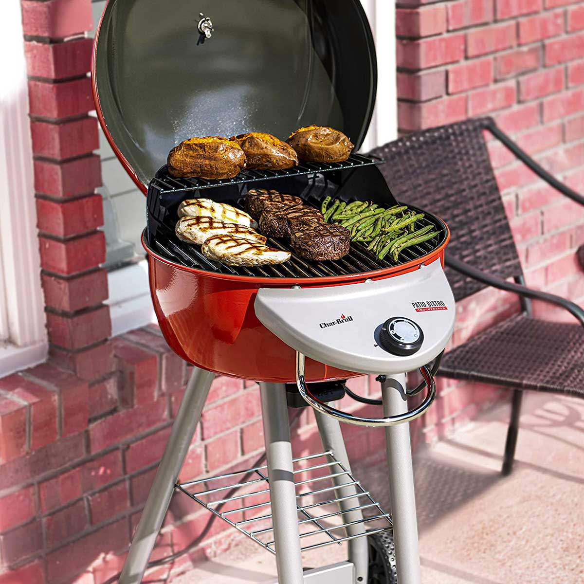 char-broil electric grill with food cooking on it