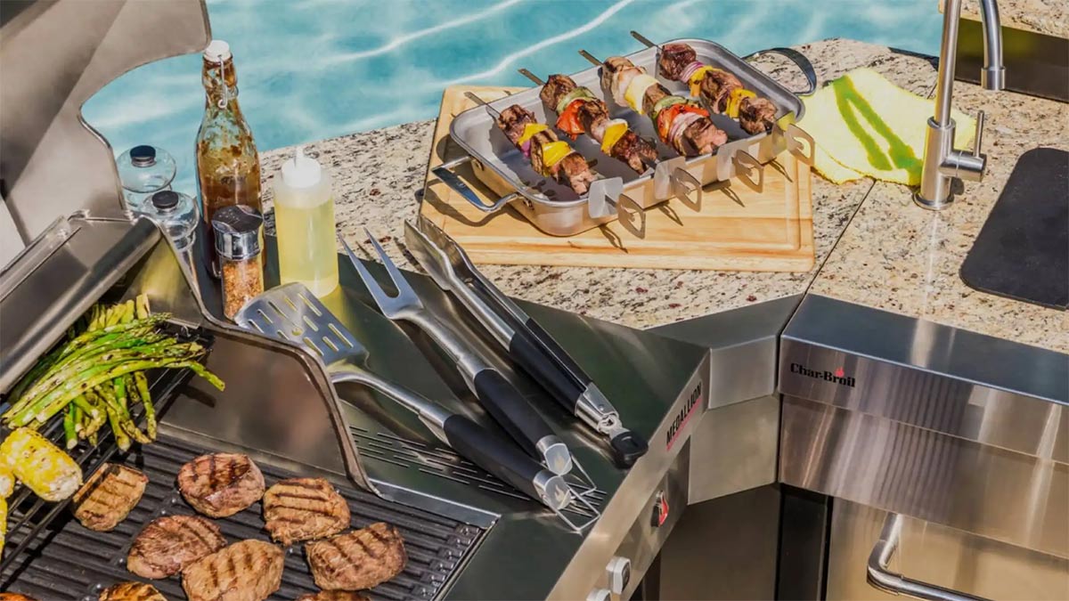 charbroil outdoor kitchen countertop with cooking utensils and food
