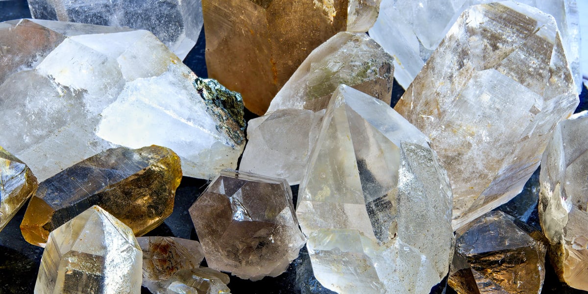 close up of clear and smoky quartz points