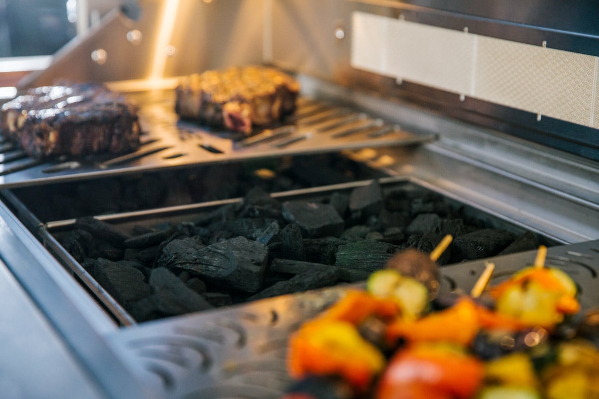 close up of drop in charcoal tray for natural gas grill