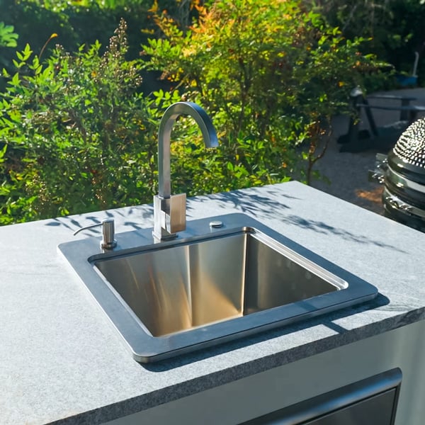 close up of grill island with sink