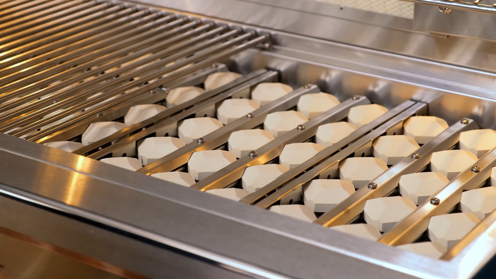 Coyote ceramic briquettes for a gas grill