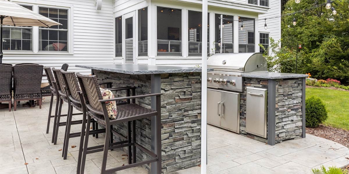 galley outdoor kitchens design with bar top chairs on patio