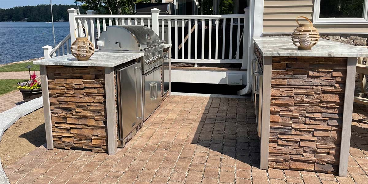 galley outdoor kitchen with gas grill and island decorations