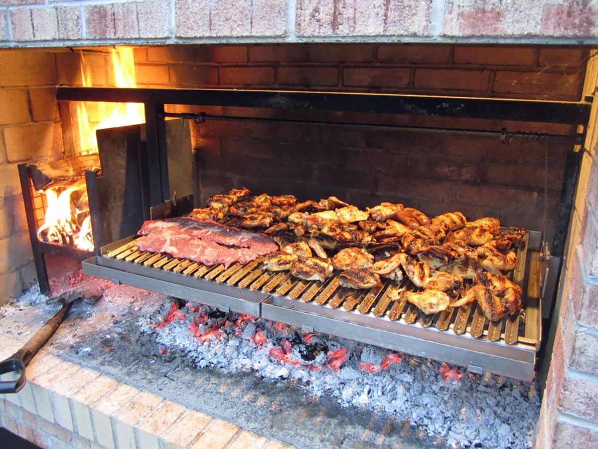 Gaucho Grills Argentinian Grill with meat cooking on it