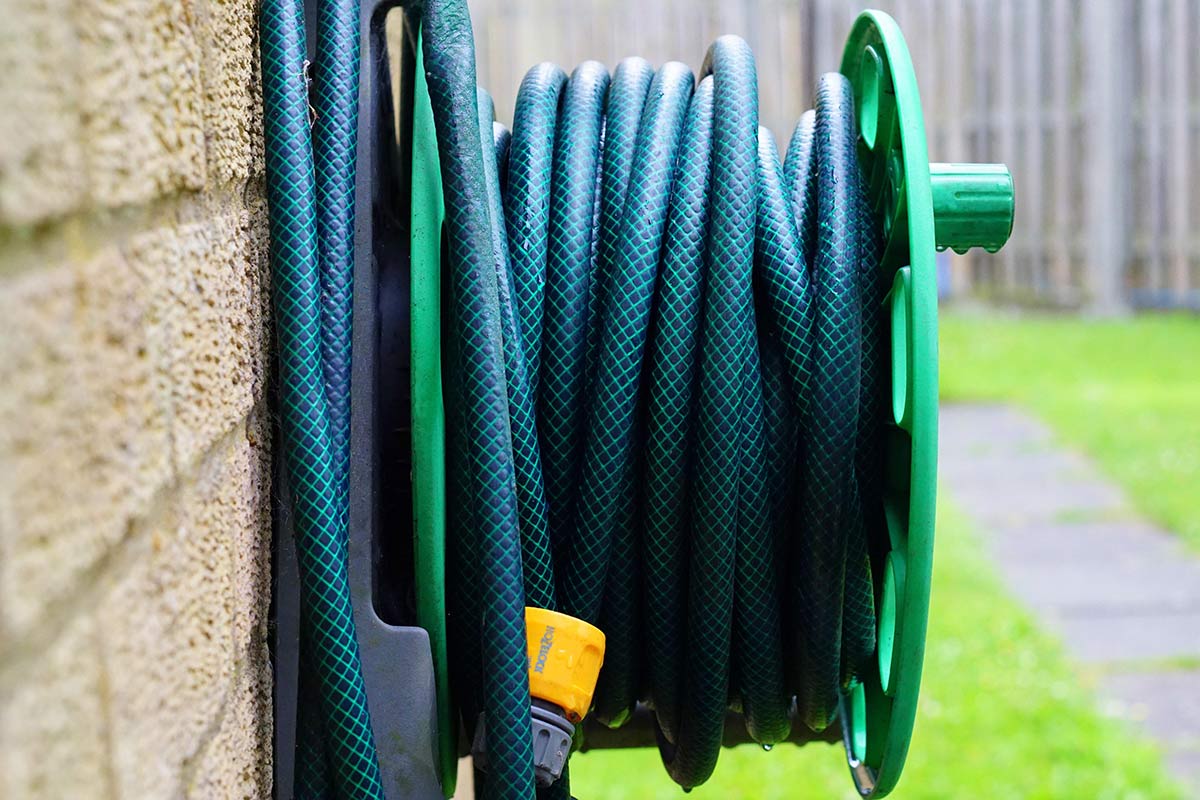 Using a hose to supply an outdoor kitchen sink