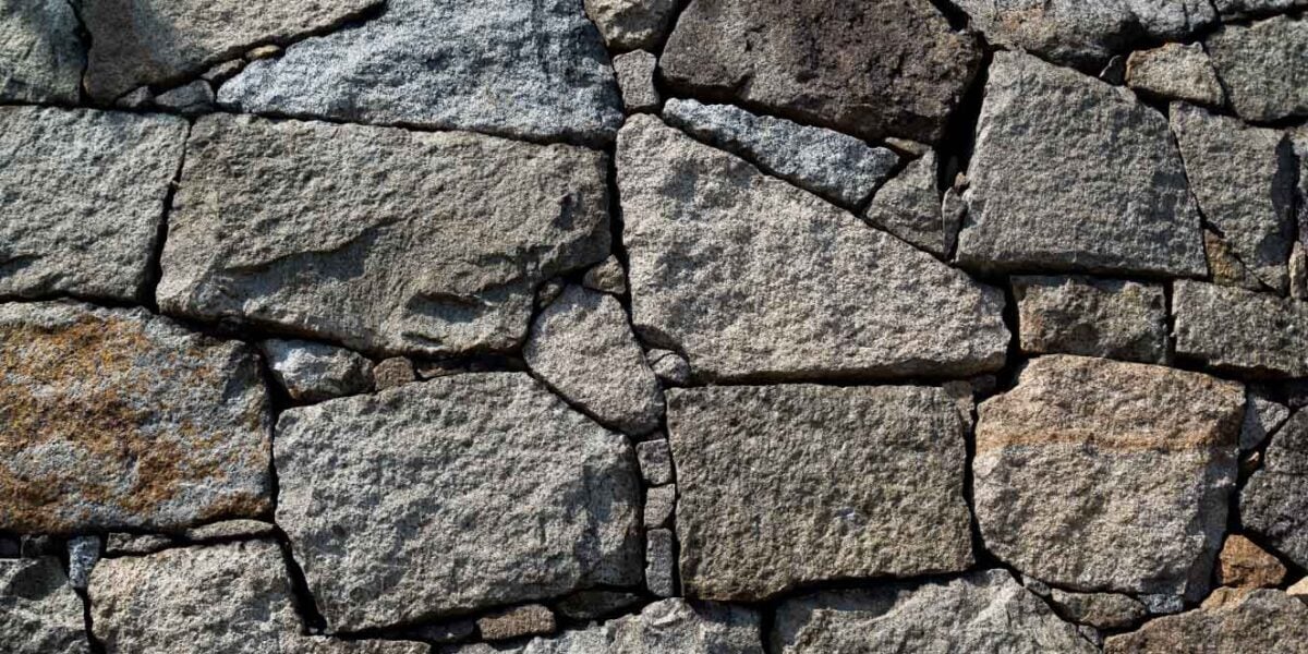 hand laid stone used for an outdoor kitchen structure