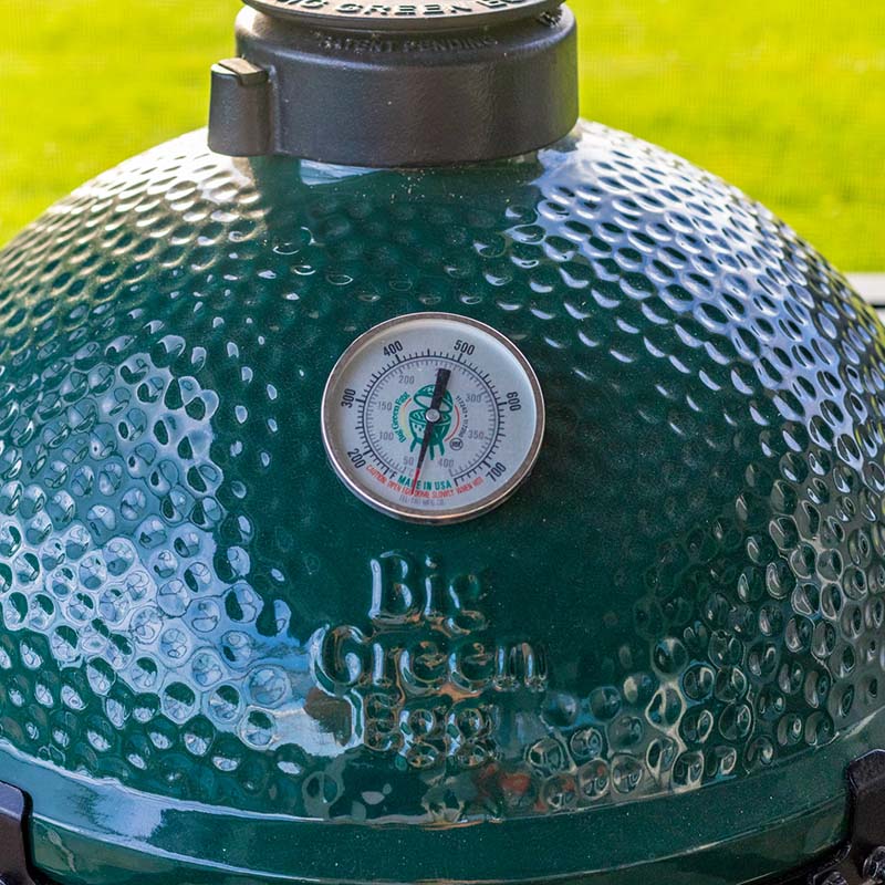image of the top of a big green egg sitting in an rta outdoor kitchen