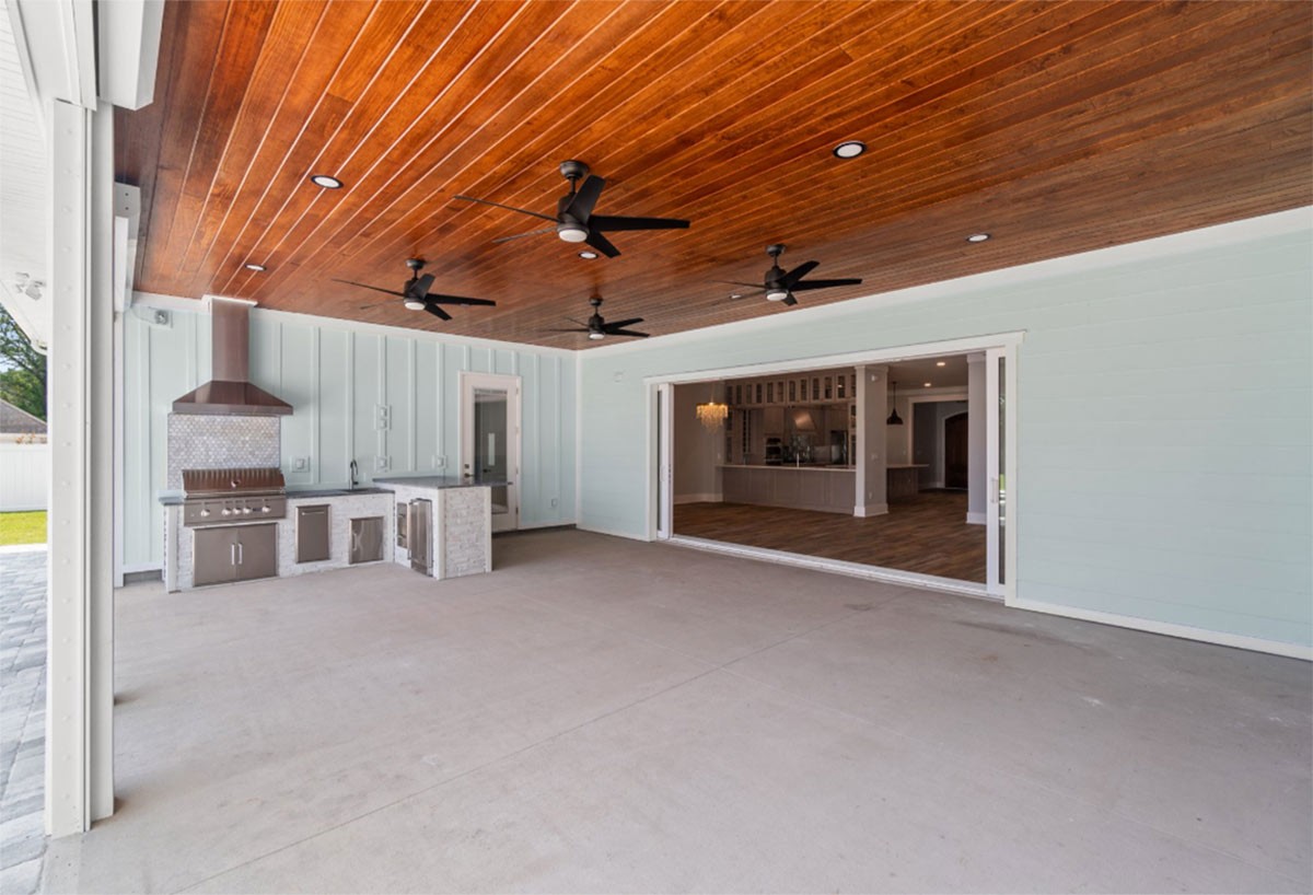 l shaped grill island with vent hood with ceiling fans