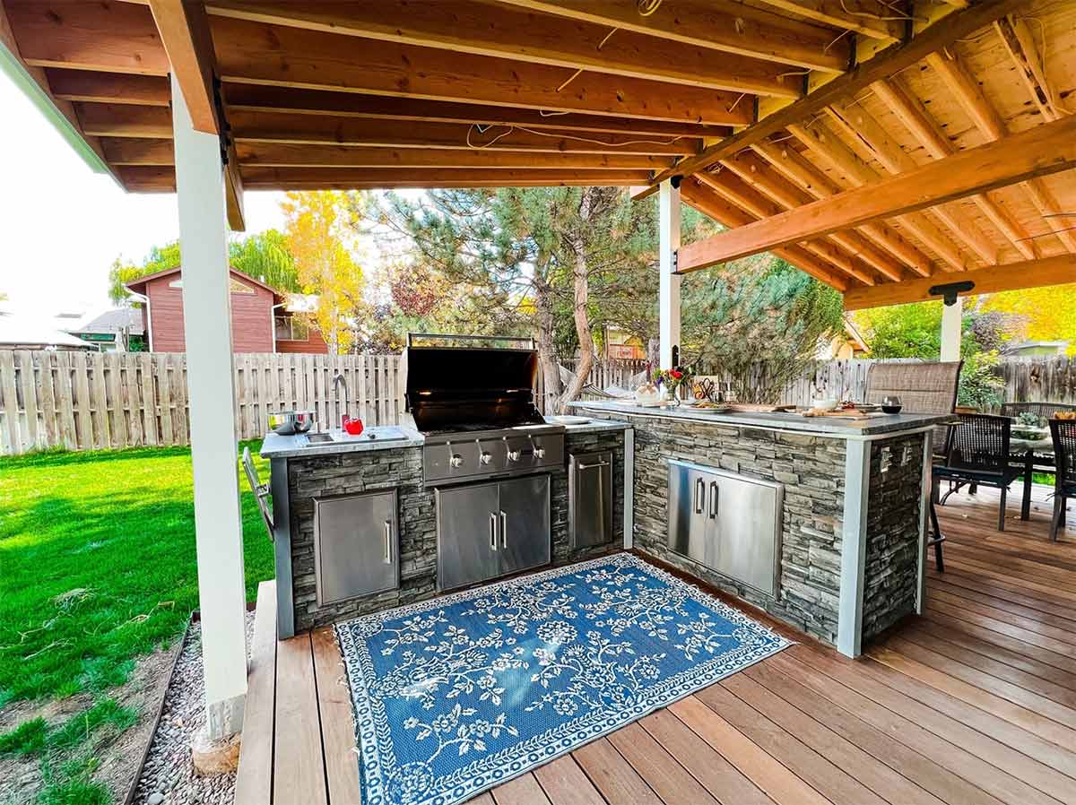 l shaped traditional outdoor luxury kitchen island and bar under gazebo