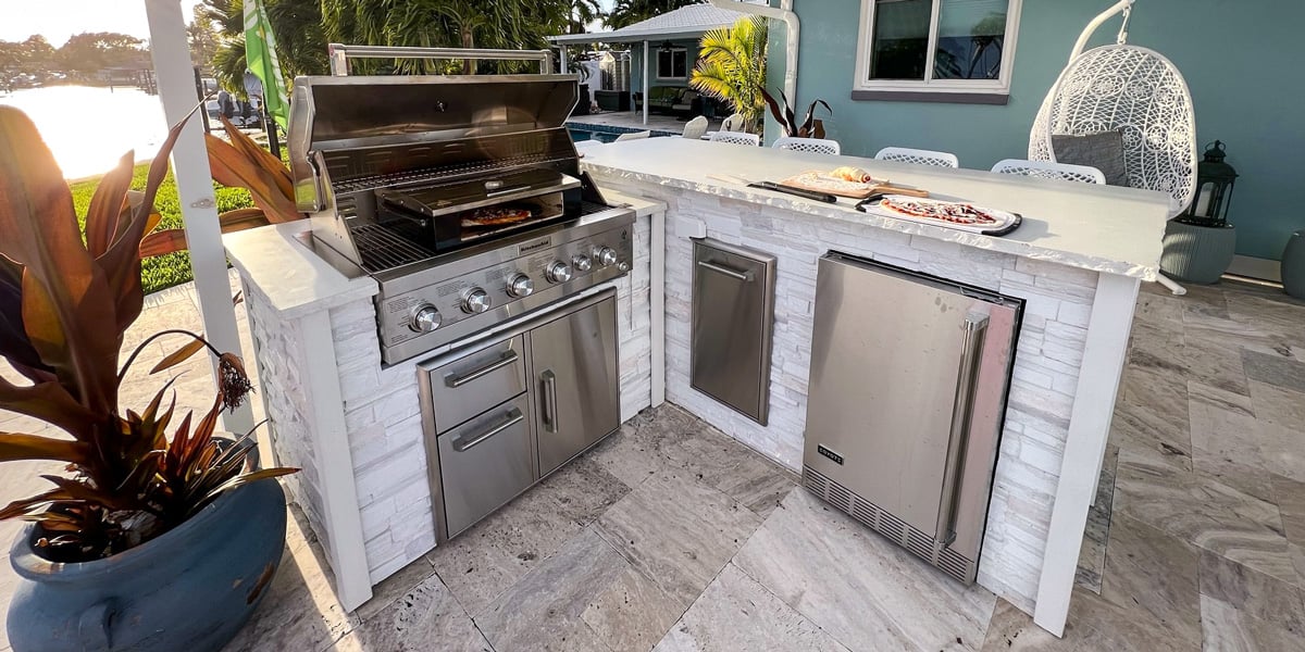 l shaped outdoor kitchen ideas with open gas grill hood