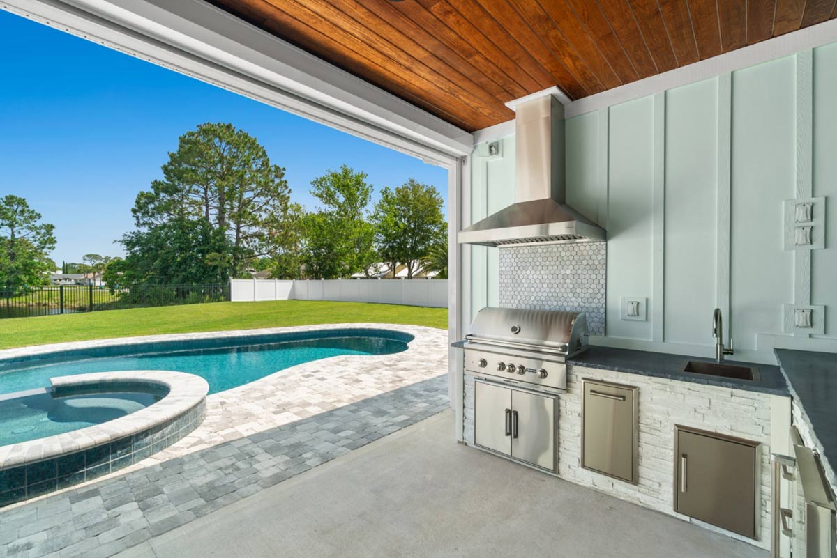l shaped outdoor kitchen with grill and sink