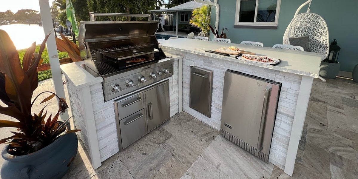 l shaped outdoor kitchen with mini fridge