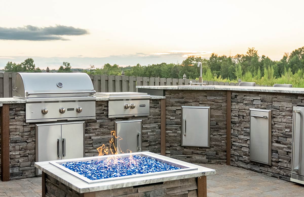 l shaped rta outdoor kitchen with fire pit