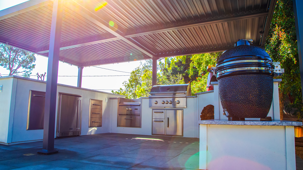 large outdoor kitchen with smoker