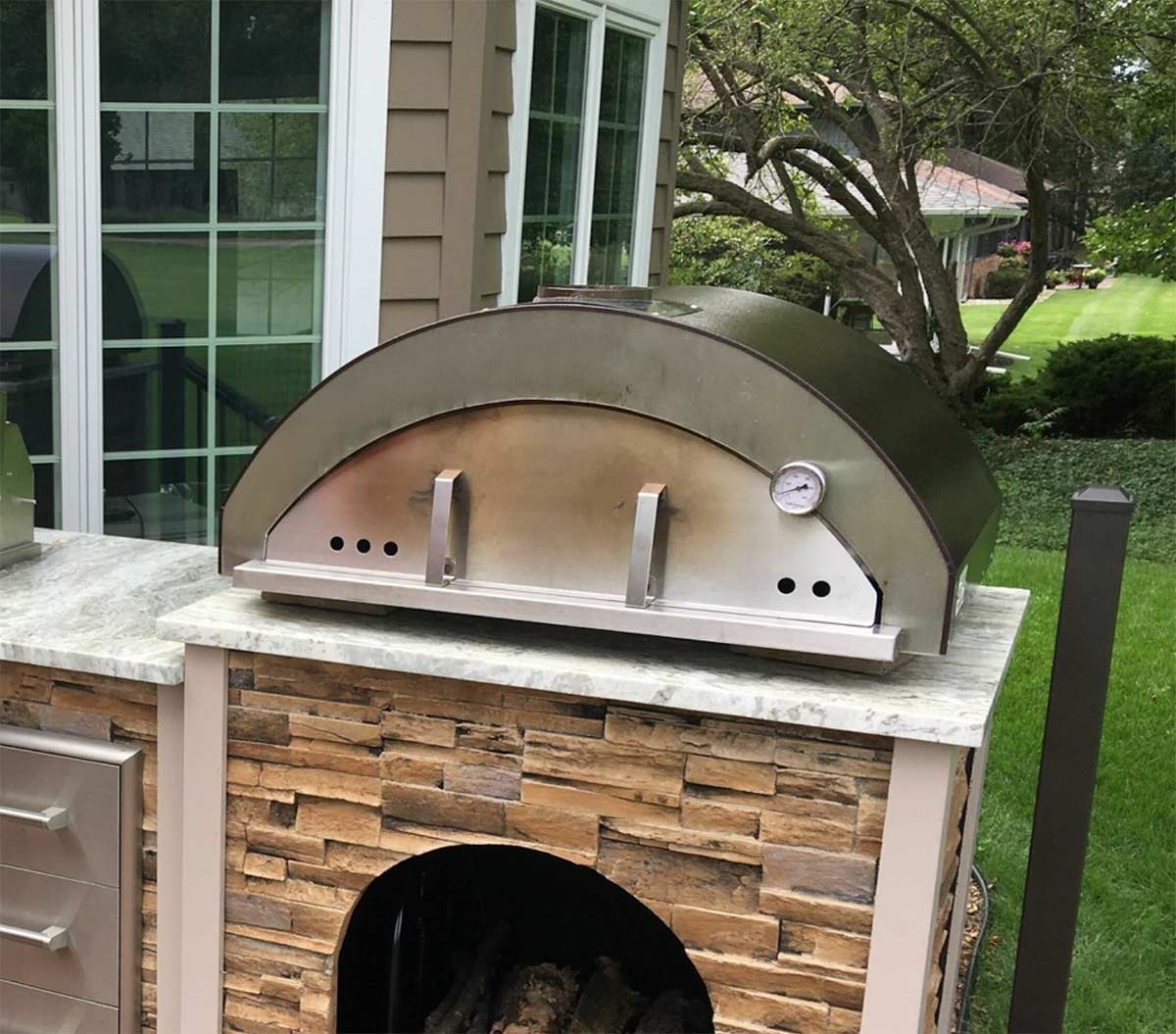 large pizza oven at outdoor kitchen