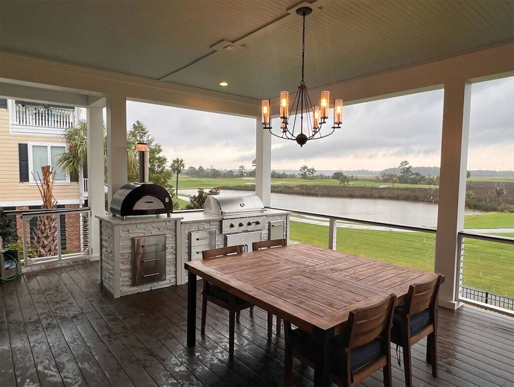 you can put an outdoor kitchen on an existing patio depending on the solution like this covered linear outdoor kitchen on deck with kitchen table and chairs