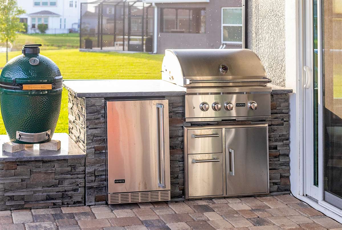 Linear Outdoor Kitchen with big green egg and outdoor kitchen combo drawers