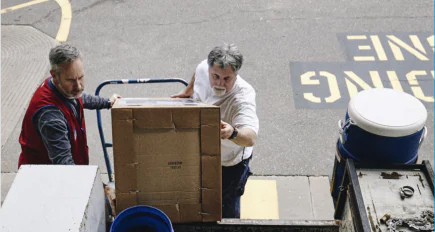 man picking up outdoor kitchen from lowes