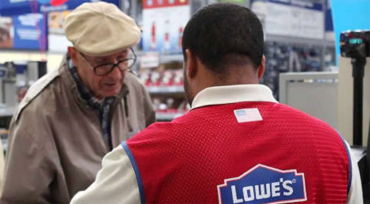 man returning purchase to lowes store
