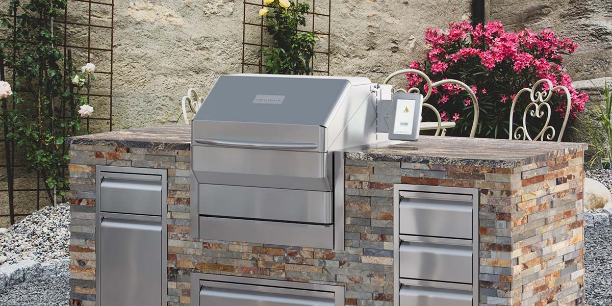 memphis pro pellet grill built in to outdoor kitchen unit -