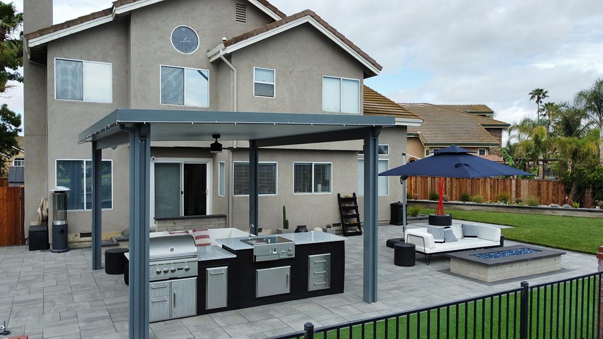 modern bbq island with combo storage and refreshment center