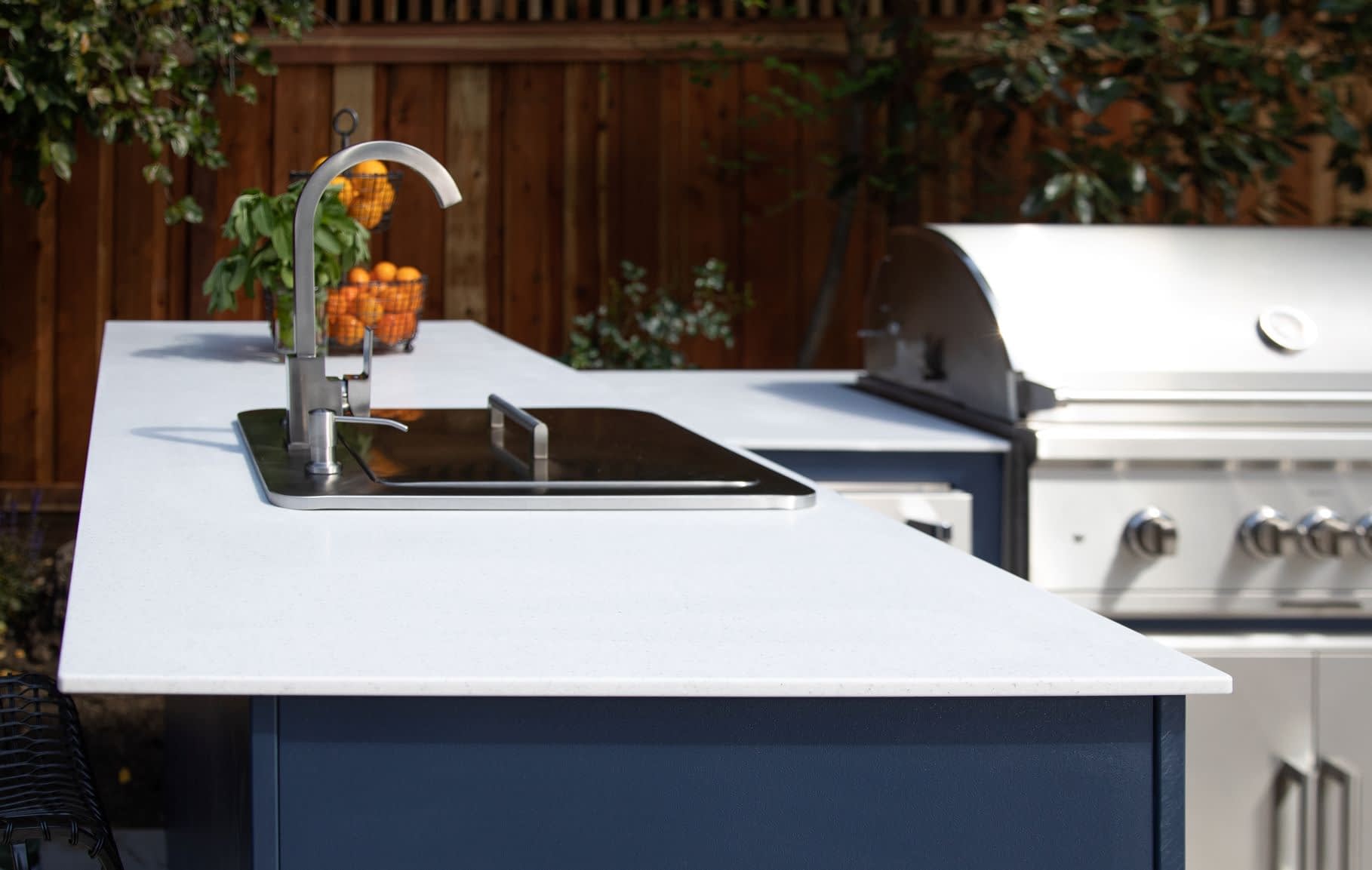 Close Up of a RTA MOKS Countertop with a Sink and Part of the Grill Visible