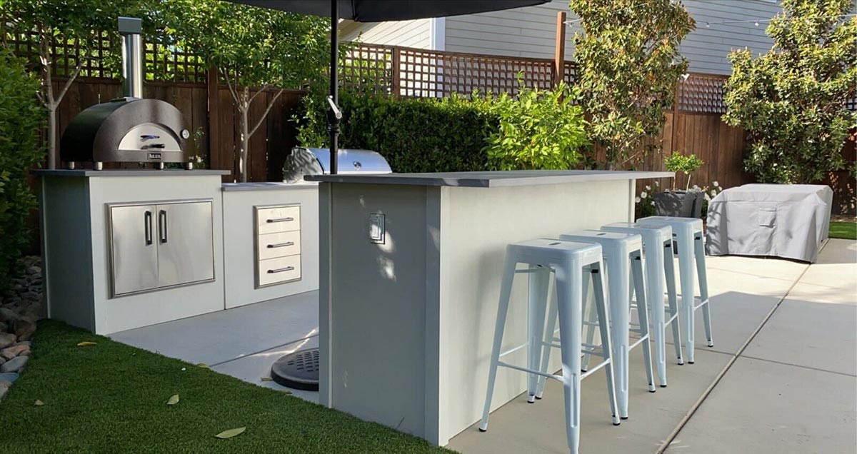moks outdoor grill station with bar seating