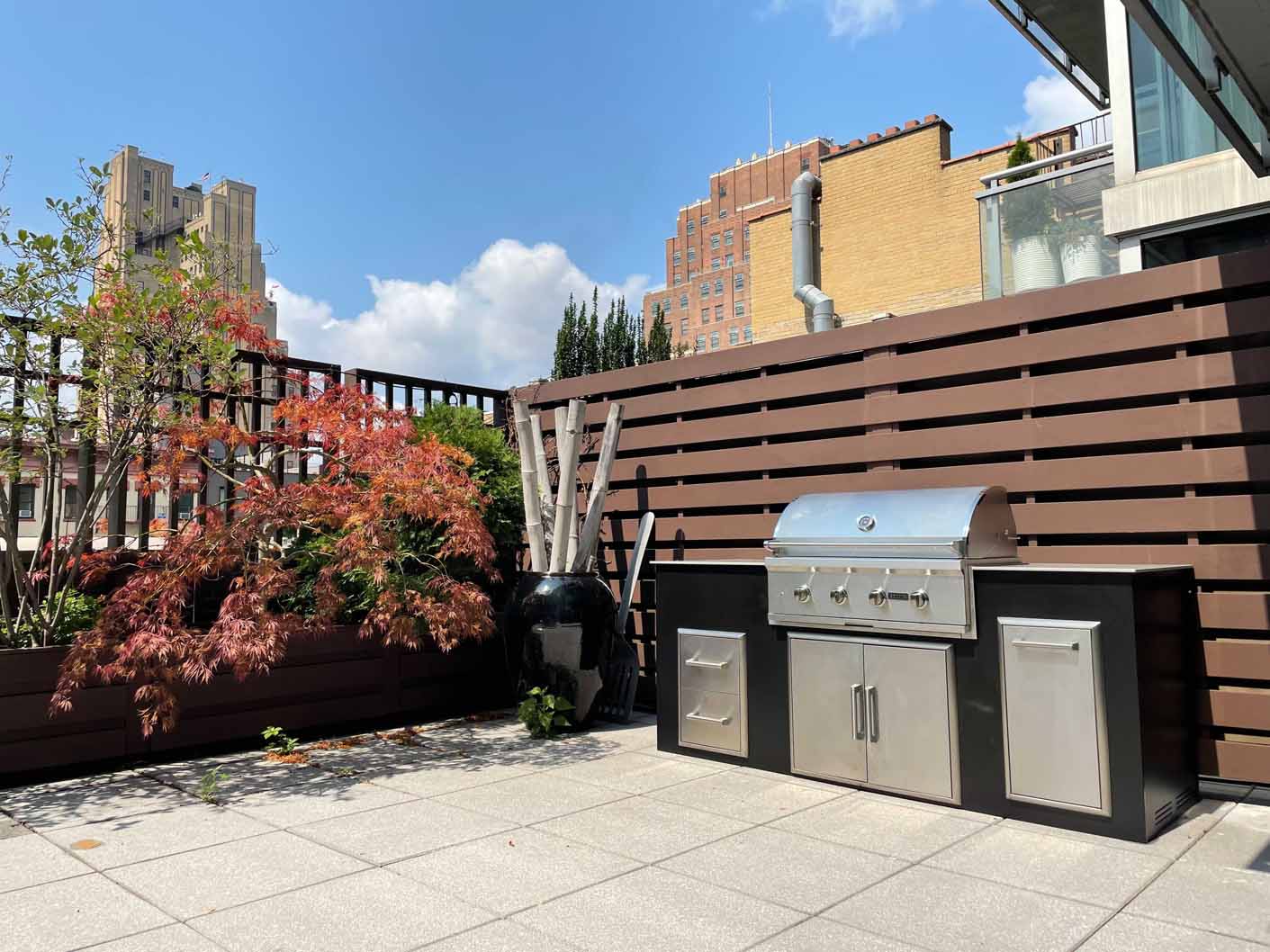 moks pitch black modern outdoor kitchen in city representing more permanent modular outdoor kitchens