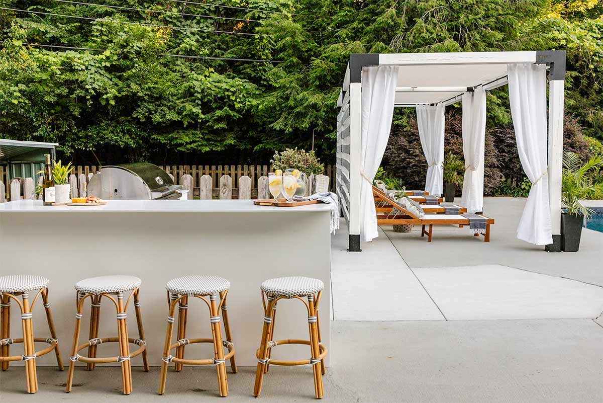 outdoor bar with stools on patio