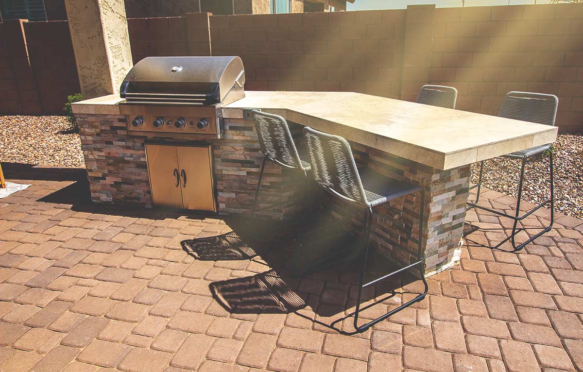 Outdoor kitchen countertop faded from being in direct sunlight