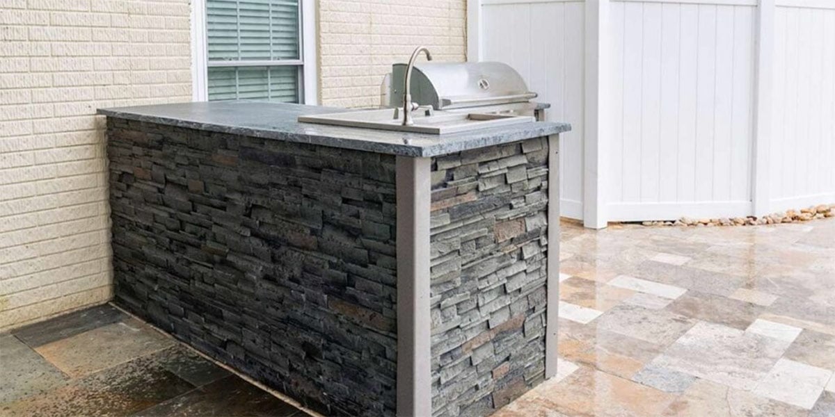 Outdoor kitchen l shape with refreshment center