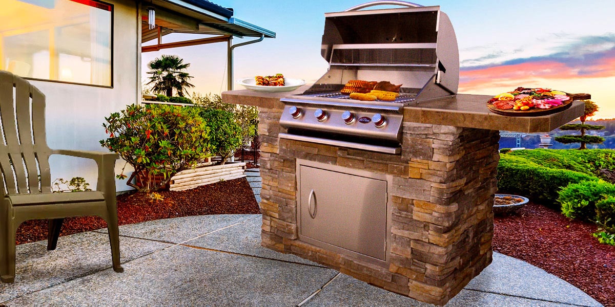 outdoor kitchen with extended countertops in tropical backyard
