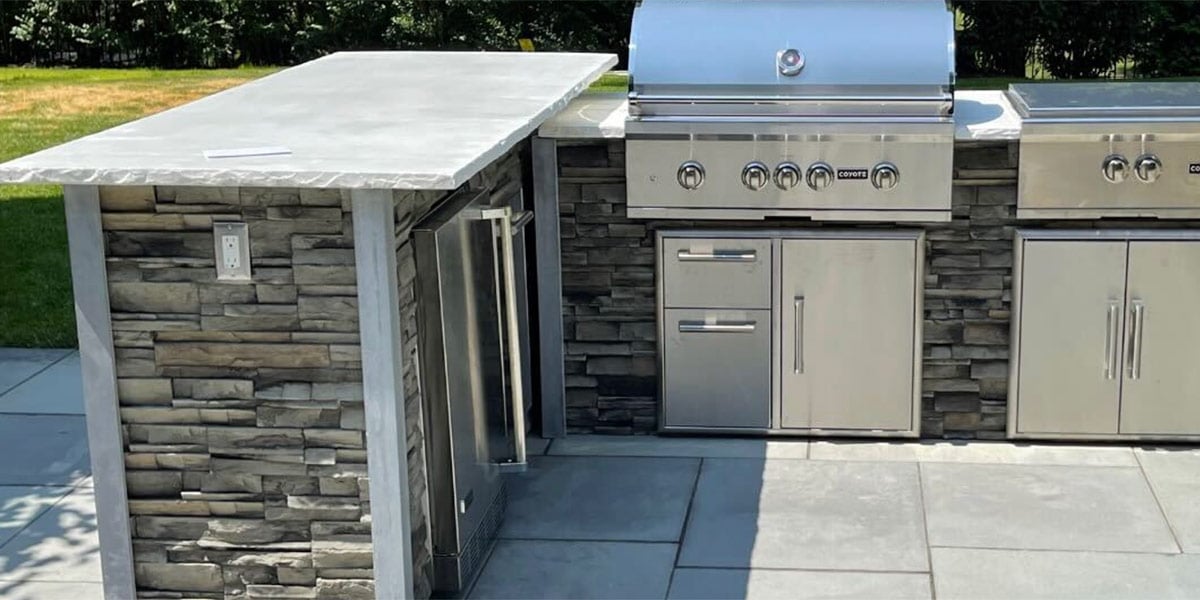 outlet on wall of outdoor kitchen