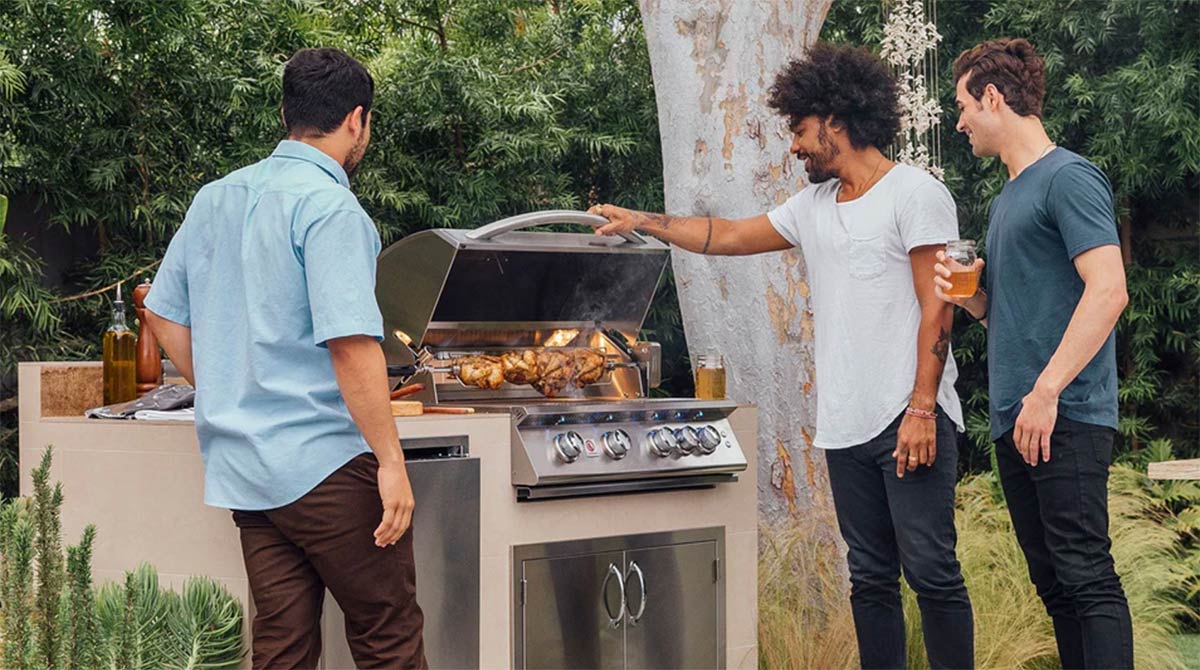 people grilling on a summerset sizzler series grill