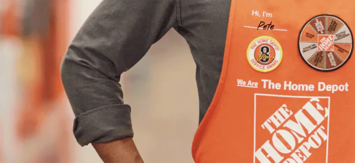 person wearing home depot apron