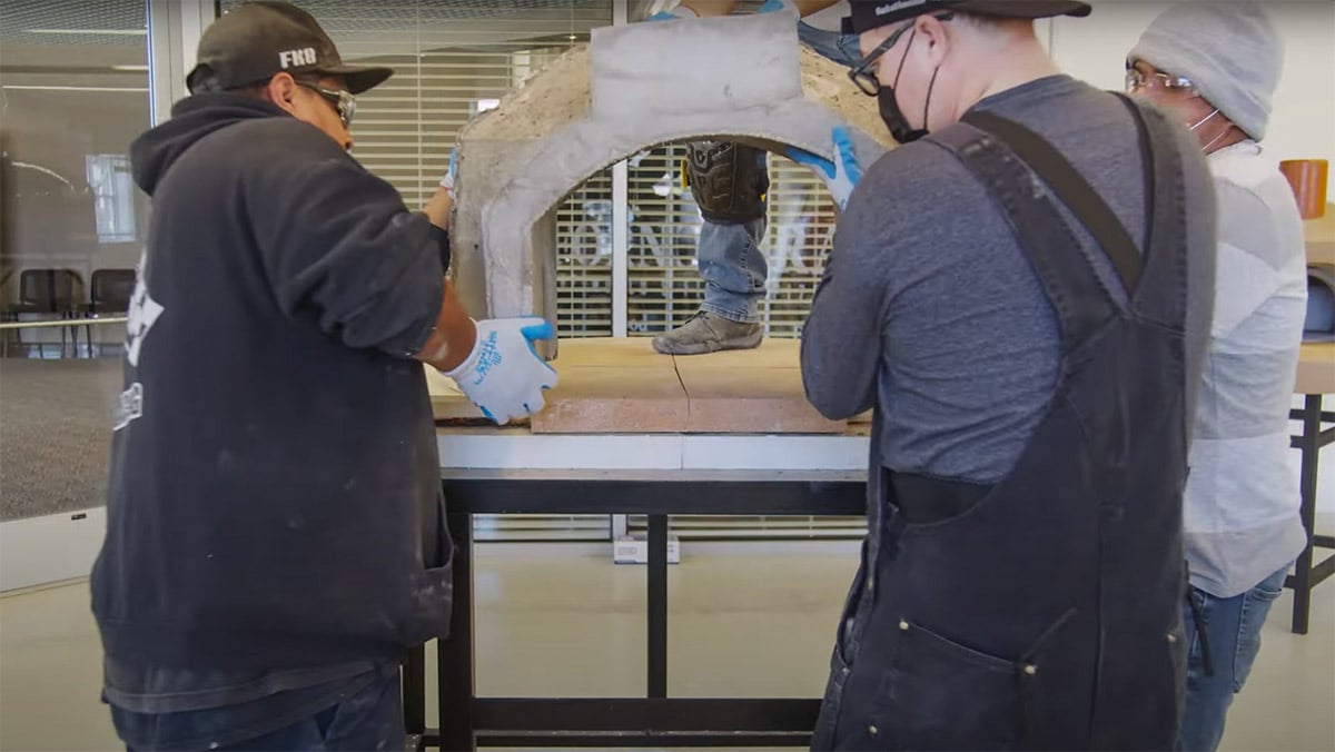 placing the refactory dome on pizza oven base