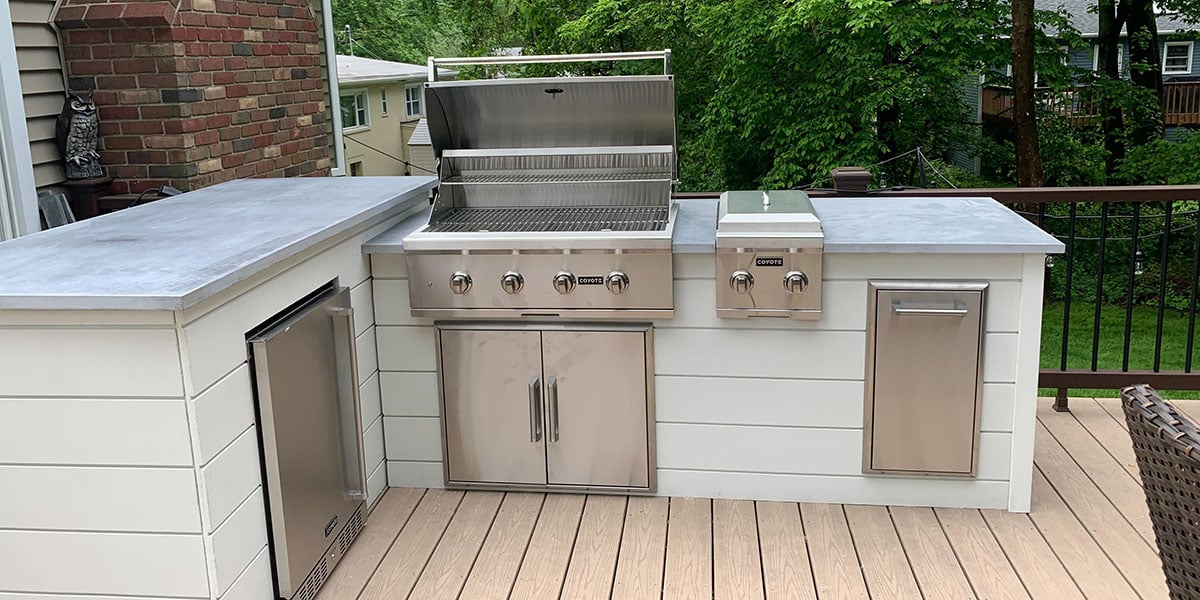 Outdoor grill area plans with grill, side burner, and trash